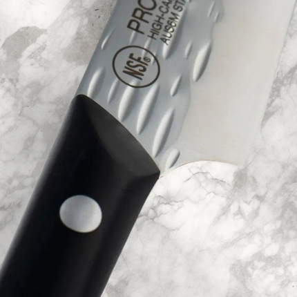 Razor Sharp AZ 3.5-inch paring knife with a hammered stainless steel blade and a black riveted POM handle.