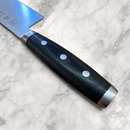 Razor Sharp AZ Perfect Edge Cutlery Dragon Classic chef's knife featuring a black Micarta full-tang handle.