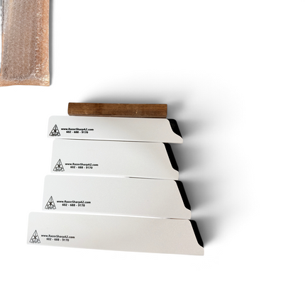 Razor Sharp AZ white velvet-lined kitchen knife edge guards in a 4-piece set with rigid ABS exterior