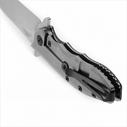 Razor Sharp AZ Zero Tolerance 0562MIC pocket knife featuring a stonewashed titanium frame lock and deep-carry clip.