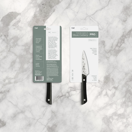 Razor Sharp AZ PRO 3.5-inch paring knife in retail packaging featuring a hammered stainless steel blade and POM handle.