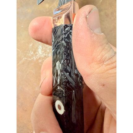 Honesuki Kitchen Knife 5.5” with Damascus-pattern blade, shredded carbon-infused handle, brass bolster.