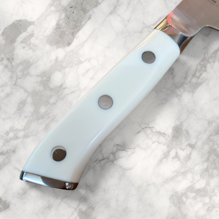 Razor Sharp AZ Shiro Hane Gyuto knife handle featuring a smooth white Corian grip with three silver rivets