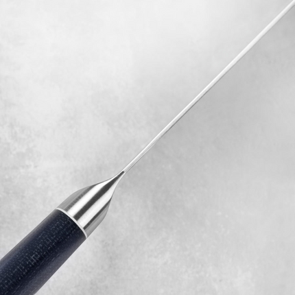 Razor Sharp AZ Shun Shiranami 7-inch Santoku knife showing the forward-tilting bolster and dark jute micarta handle