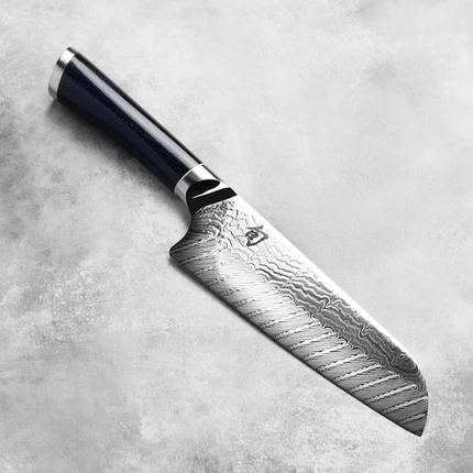 Razor Sharp AZ Shun Shiranami 7-inch Santoku knife with a wave-pattern Damascus steel blade and dark micarta handle.