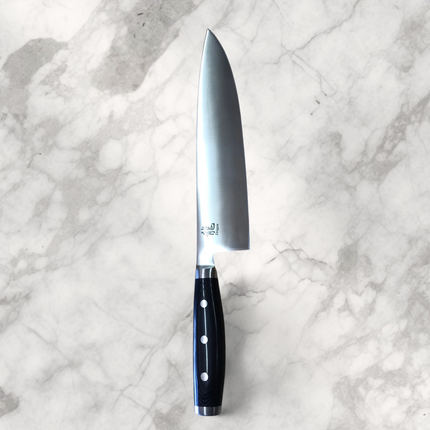 Razor Sharp AZ Dragon by Apogee 10-inch chef's knife with a satin finish stainless blade and black micarta handle.