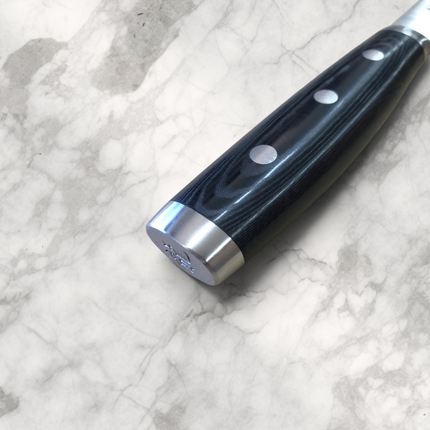 Razor Sharp AZ Dragon by Apogee 10in chef's knife handle made of black resin and linen canvas micarta with rivets.