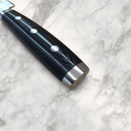 Razor Sharp AZ Dragon by Apogee 10-inch chef's knife featuring a black resin and linen canvas micarta handle.