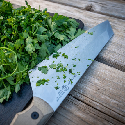Razor Sharp AZ Messermeister Overland Chef 8 inch camp knife with canvas Micarta handle chopping fresh parsley