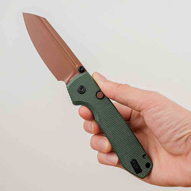 Raccoon 2.0 Top Liner Lock folding knife with copper-dune 3.25in blade and green Micarta handle