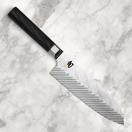 Razor Sharp AZ Shun Dual Core 7-inch Santoku knife with a herringbone patterned steel blade and black PakkaWood handle.