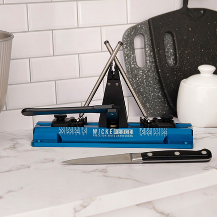 Razor Sharp AZ WE64 Cobalt Pro Pack I precision knife sharpening system with blue base and adjustable angle guides.