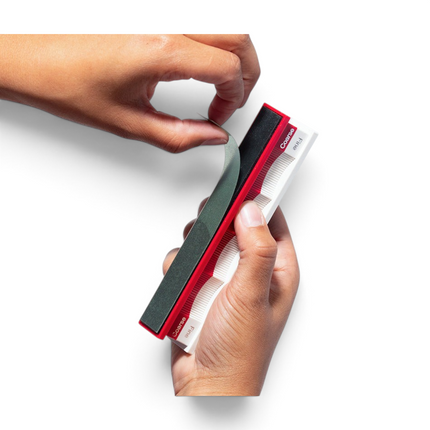 Razor Sharp AZ convex edge handle with red coarse and white fine sides being used with diamond lapping film