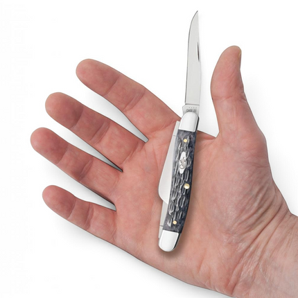 Razor Sharp AZ Case Pocket Worn Crandall Jig Gray Bone Medium Stockman knife held in a palm with mirror-polished blades