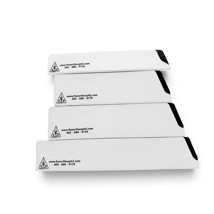 Razor Sharp AZ four-piece set of white rigid ABS knife edge guards with velvet-lined interiors for kitchen storage