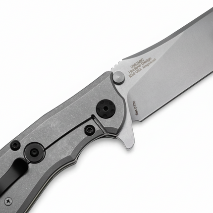 Razor Sharp AZ Zero Tolerance 0562MIC pocket knife featuring a stonewashed titanium frame lock and MagnaCut steel blade