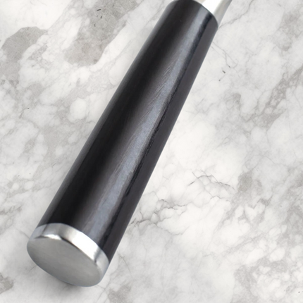 Razor Sharp AZ Shun Classic 4-inch paring knife featuring a dark ebony Pakkawood D-shaped handle with steel bolster.