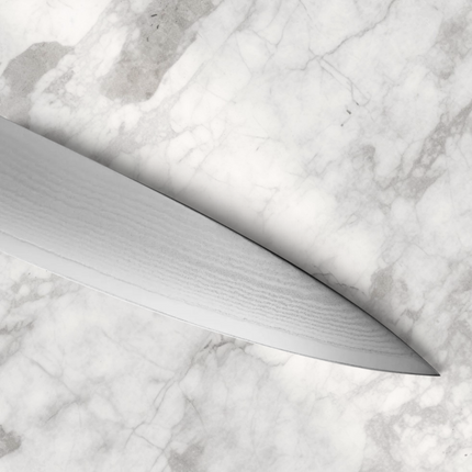 Razor Sharp AZ Shun Classic 4-inch paring knife blade featuring detailed Damascus steel layering and sharp edge.