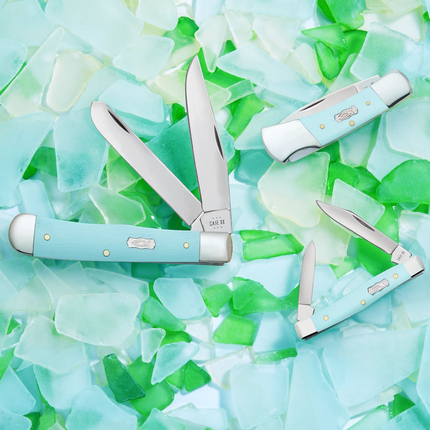 Razor Sharp AZ Case Trapper knife with seafoam green G-10 handles and mirror-polished stainless steel blades.