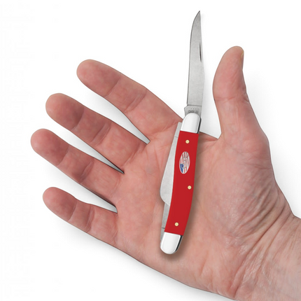 Razor Sharp AZ Case American Workman red synthetic handle stockman pocket knife held in an open palm