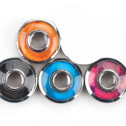 Tension dial color options: black, orange, blue and pink
