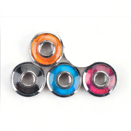 Tension dial color options: black, orange, blue and pink