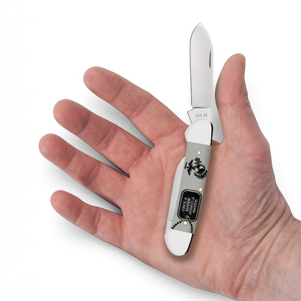 Razor Sharp AZ Case USMC Canoe folding knife with a smooth gray synthetic handle held in an open palm