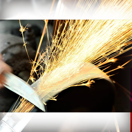 Razor Sharp AZ blade sharpening service with bright sparks flying from a knife being sharpened.