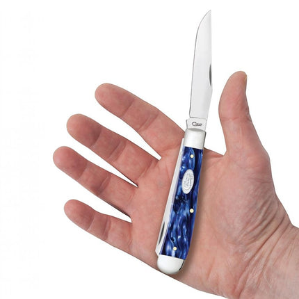 Razor Sharp AZ Case Trapper pocket knife with a smooth blue pearl Kirinite handle held in an open palm
