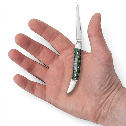 Razor Sharp AZ Case Abalone Small Texas Toothpick knife with a mirror-polished stainless steel clip blade in a hand