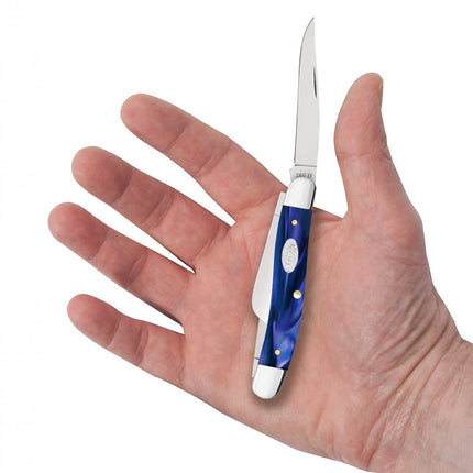 Razor Sharp AZ Case medium stockman pocket knife with smooth blue pearl Kirinite handle held in an open palm