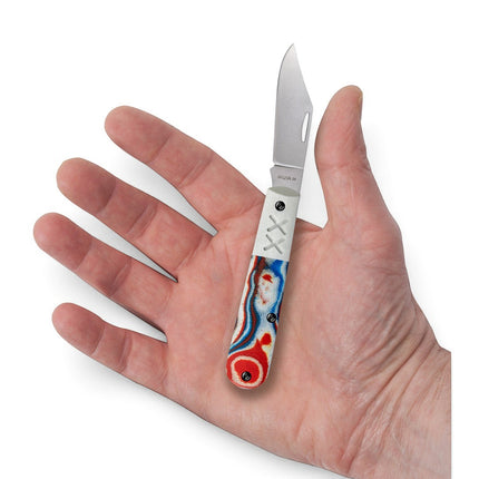 Razor Sharp AZ Case Crossroads Barlow knife with red, white, and blue burl G-10 handle held in a person's palm.