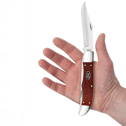 Razor Sharp AZ Case Folding Hunter knife with dark red burlap Micarta handle and mirror-polished carbon steel blade.