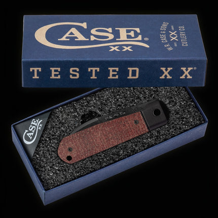 Razor Sharp AZ Case Highbanks folding knife with red burlap micarta handle in a blue branded gift box.