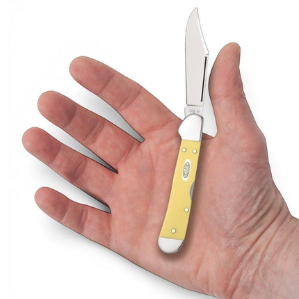 Razor Sharp AZ Case Mini CopperLock pocket knife with a bright yellow handle and mirror-polished carbon steel blade.