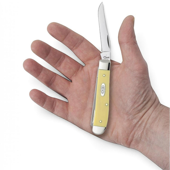 Razor Sharp AZ Case Yellow Synthetic Mini Trapper pocket knife with two stainless steel blades held in a hand