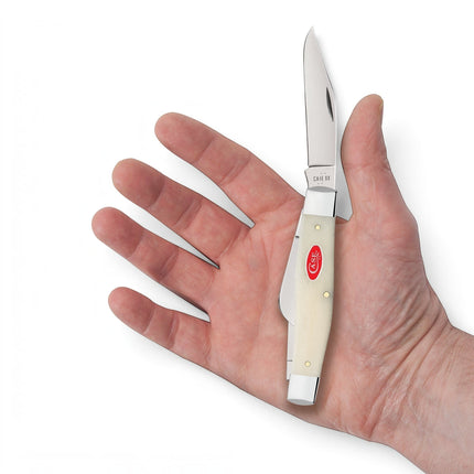 Razor Sharp AZ Case Smooth Natural Bone Large Stockman folding knife with three blades held in a person's palm