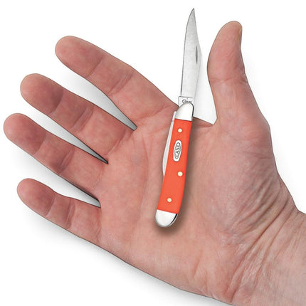 Razor Sharp AZ Case Smooth Orange Synthetic Peanut pocket knife held in a palm, featuring two stainless steel blades.