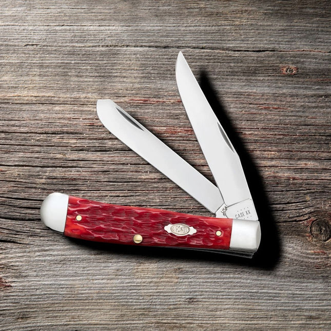 Razor Sharp AZ Case Peach Seed jigged dark red bone handle trapper knife with two mirror-polished carbon steel blades