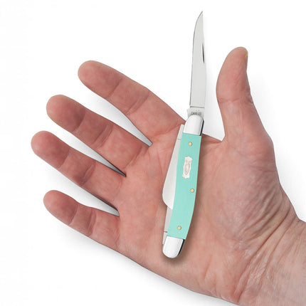 Razor Sharp AZ Case Medium Stockman pocket knife with seafoam green G-10 handles and Ichthus shield held in a hand