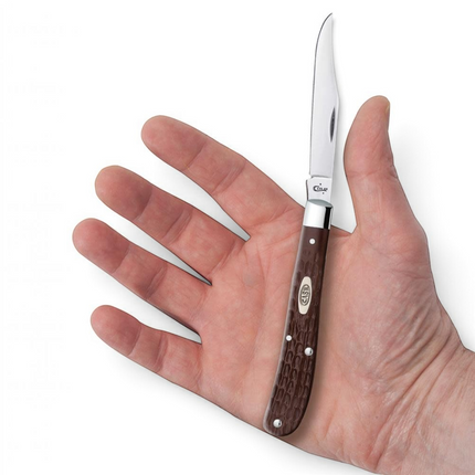 Razor Sharp AZ Case Slimline Trapper knife with a brown jigged synthetic handle and polished stainless steel blade