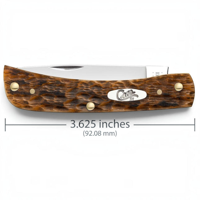 Razor Sharp AZ Case Sod Buster Jr pocket knife with a peach seed jig amber bone handle and mirror-polished blade.