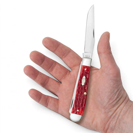 Razor Sharp AZ Case Trapper knife with dark red bone peach seed jig handle and mirror-polished carbon steel blade
