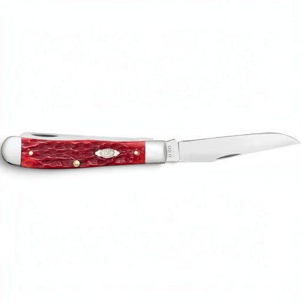 Razor Sharp AZ Case Trapper knife with dark red bone peach seed jig handle and polished carbon steel clip blade