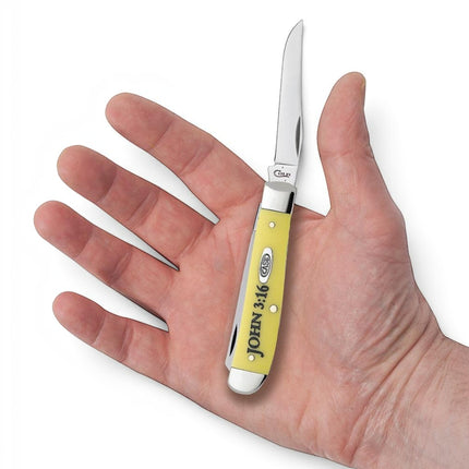 Razor Sharp AZ Case Mini Trapper knife with yellow synthetic handle featuring John 3:16 text held in a palm