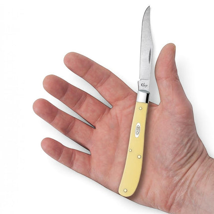 Razor Sharp AZ Case Yellow Synthetic Slimline Trapper pocket knife with a single clip blade held in a hand.