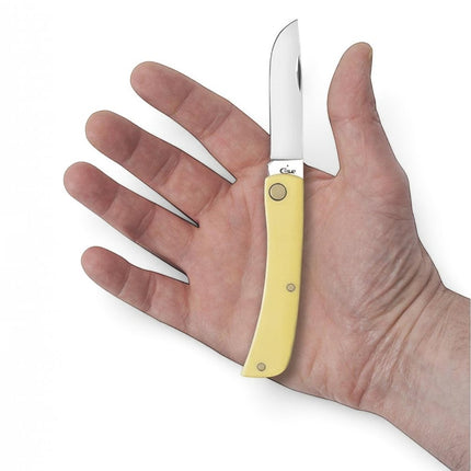 Razor Sharp AZ Case Sod Buster Jr pocket knife with a yellow synthetic handle and stainless steel clip point blade