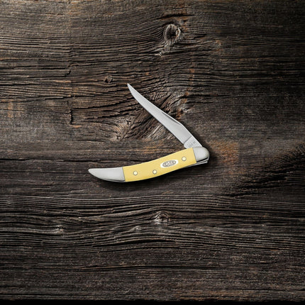 Razor Sharp AZ Case Yellow Synthetic Small Texas Toothpick pocket knife with a mirror-polished clip blade.