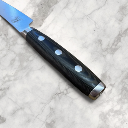 Razor Sharp AZ Perfect Edge Cutlery Dragon Classic 6-inch fillet knife with black Micarta handle on wooden board