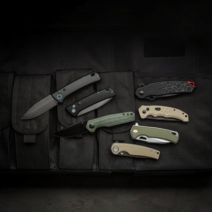 Razor Sharp AZ collection of folding knives in various colors including black, green, and tan, displayed on a black tactical background.